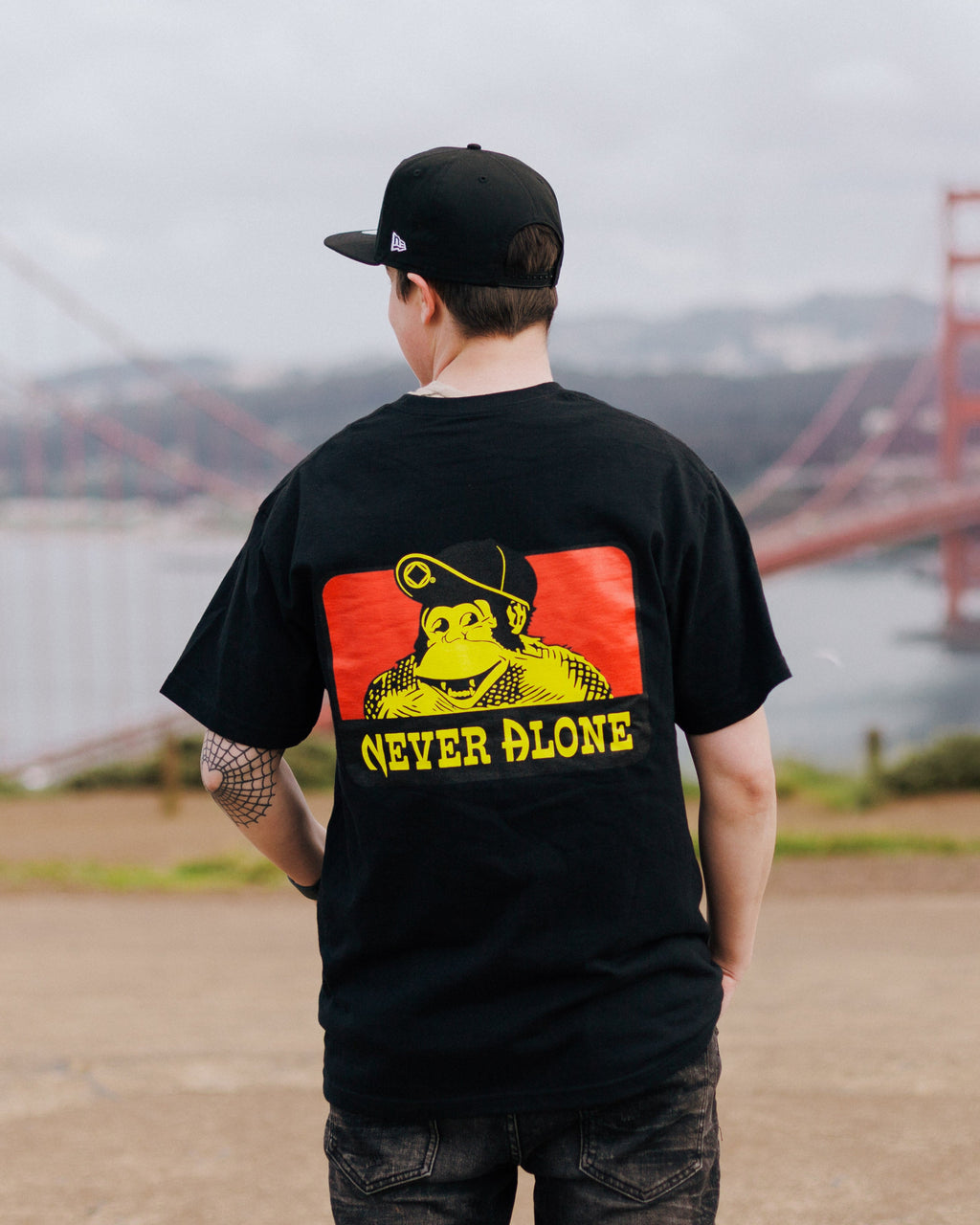 Never Alone/ Unisex Crewneck T Shirt / Black